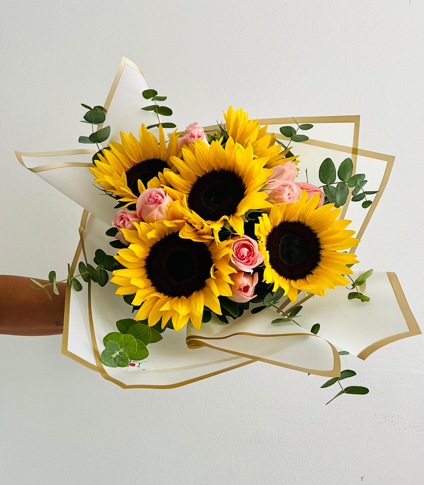 Ramo girasoles rosas rosadas